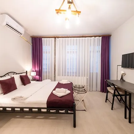 Отель Frame & Suites